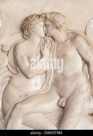 Ancient sculpture with kissing couple, Florence - Italy Stock Photo