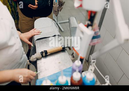 Dry cleaning clothes. Clean cloth chemical process. Laundry industrial dry-cleaning Stock Photo