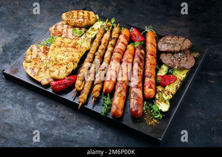 Traditional grill platter with bratwurst Stock Photo