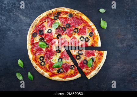 Traditional Italian pizza al salame with salami Stock Photo