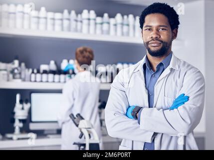 Science, innovation and portrait of man in laboratory, leadership and motivation in vaccine development in South Africa. Healthcare, phd scientist or Stock Photo