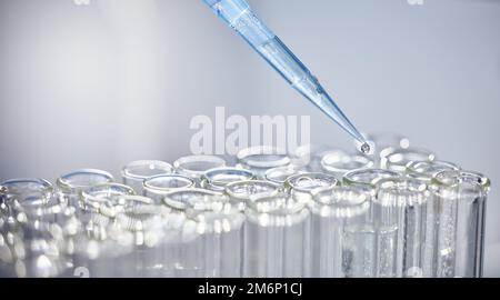 Science, test tubes and syringe for research, experiment or project in chemistry laboratory. Glass vials, innovation and chemical liquid for Stock Photo