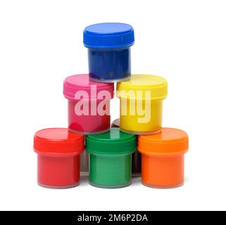 Plastic jars with multi-colored gouache on a white isolated background Stock Photo