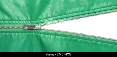 Green leather texture and open metal zipper isolated on white background. Business background, banner, header, mockup with copy space. Top view, flat Stock Photo