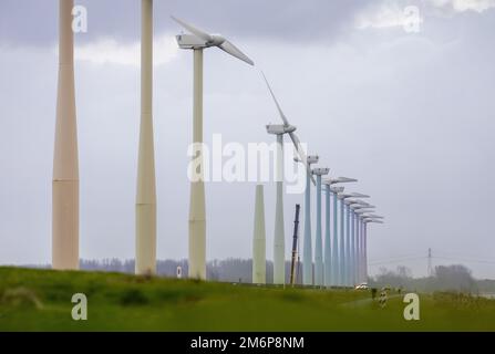 ZEEWOLDE - Work with a crane on the debris of the demolished windmill in Zeewolde. The wind turbine was an older model and stopped after an error message. The wind was blowing hard, but it is not yet clear whether the windmill has broken as a result. ANP ROBIN VAN LONKHUIJSEN netherlands out - belgium out Stock Photo