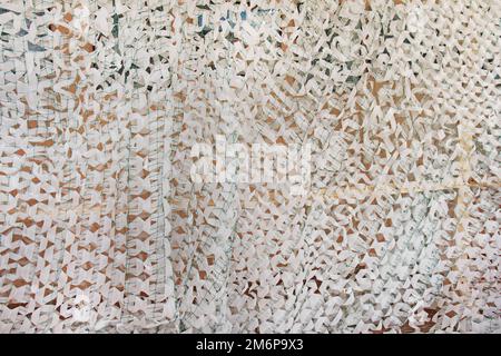 Winter camouflage netting for soldiers of the Ukrainian army Stock Photo