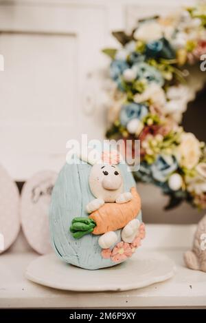 A closeup shot of the blue cake egg for Easter celebration Stock Photo