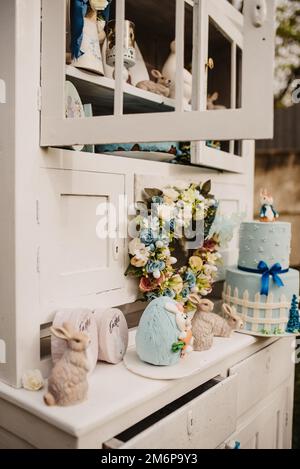 The flowers, cookies and cakes in the shelf for Easter decoration Stock Photo