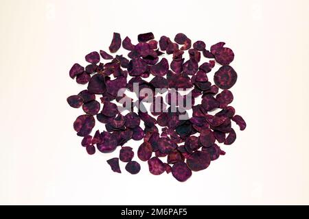 Dried purple sweet potatoes on the white background Stock Photo