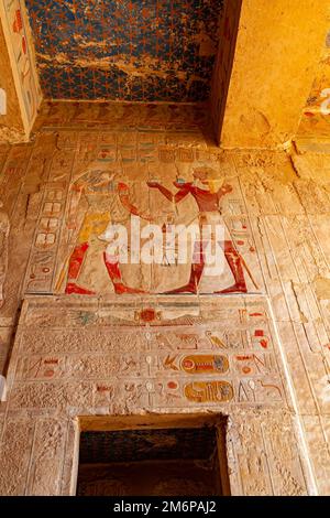 Image on the wall above the entrance in The Shrine to Anubis in Temple of Pharaoh Hatshepsut. Stock Photo