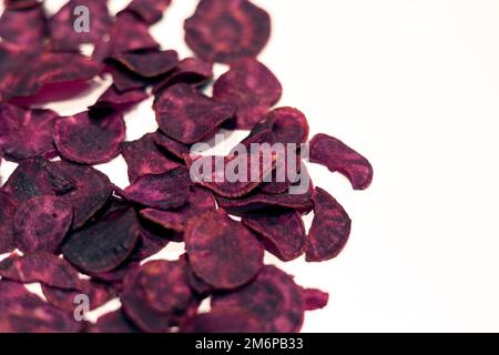 Dried purple sweet potatoes on the white background Stock Photo