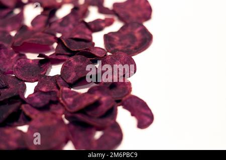 Dried purple sweet potatoes on the white background Stock Photo