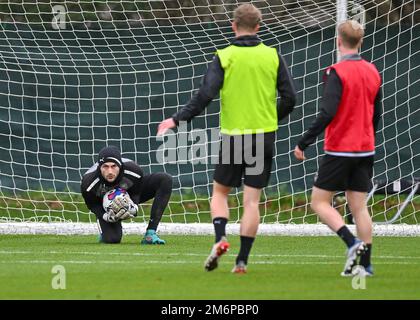 Plymouth, UK. 05th Jan, 2023. Plymouth Argyle goalkeeper Callum Burton (25) makes a save during the Plymouth Argyle Training Session at Plymouth Argyle Training Ground, Plymouth, United Kingdom, 5th January 2023 (Photo by Stanley Kasala/News Images) in Plymouth, United Kingdom on 1/5/2023. (Photo by Stanley Kasala/News Images/Sipa USA) Credit: Sipa USA/Alamy Live News Stock Photo