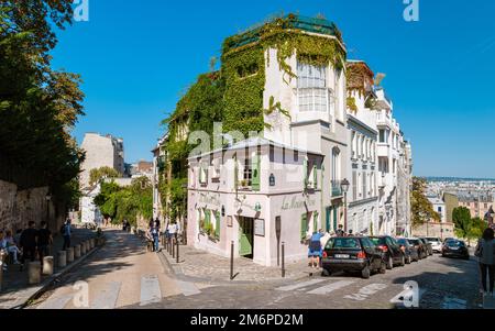 Streets of Montmartre Paris France in the early morning with cafes and restaurants, La Maison Rose Stock Photo