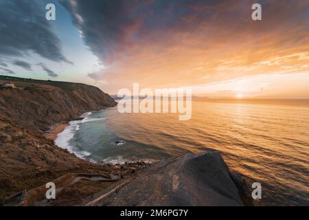 Sunset at the Flysch coastline, Barrika beach near Bilbao in the Basque Country, Spain Stock Photo