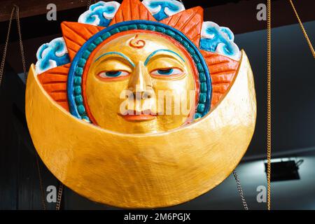 Wooden handicraft of a Moon God kept for sale in Kathmandu. Stock Photo