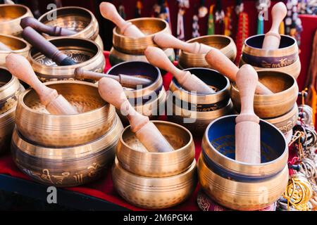 Tibetan Meditation Om Mani Padme Hum Peace Singing Bowl sets kept for sale in Kathmandu Nepal. Stock Photo