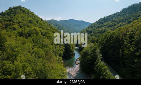 Aerial mountain landscape and river natural scenery in Russia, Adygea, Guzeripl, Plateau Lago-Naki. Stock Photo