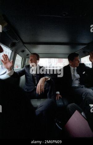 President elect Ronald Reagan and President Jimmy Carter ride in a limousine to the United States Capitol for the Inaugural ceremony in Washington DC - 1/20/1981 Stock Photo