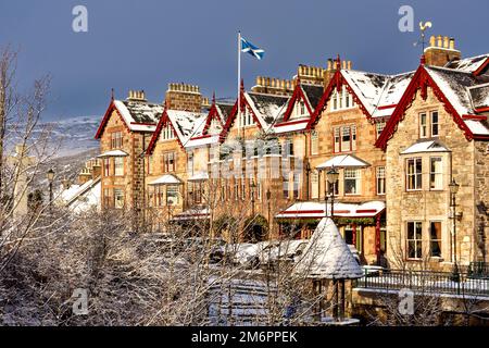 Fife Arms Hotel Braemar Scotland in winter and the building covered by snow Stock Photo