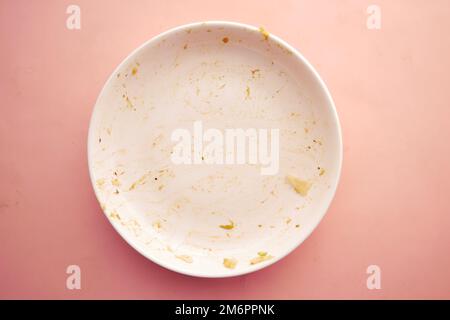 Empty plate after eating on table  Stock Photo