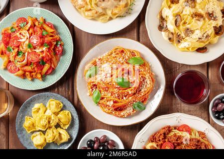 Pasta, many different varieties, overhead flat lay shot. Italian food and drinks Stock Photo