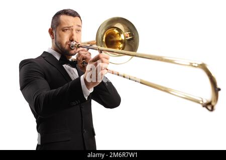 Young man playing a trombone isolated on white background Stock Photo
