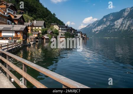 Hallstatt village on Lake Hallstatt's western shore in Austria's mountainous Salzkammergut region Stock Photo