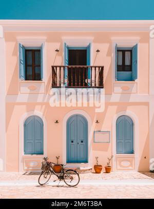 Old Greek shutter window at a Greek village Stock Photo