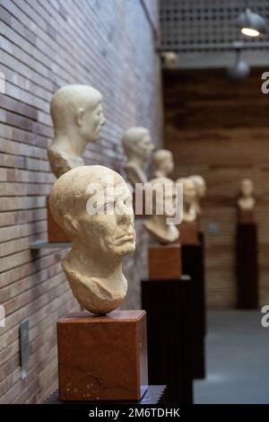 Merida, Spain - 28 Dec 23: A collection of Roman busts on display at the National Museum of Roman Art Stock Photo