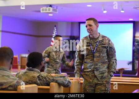 Chaplain (Lt. Col.) Matthew Atkins, 10th Mountain Division (LI) chaplain, spoke with Soldiers before introducing the guest speaker for a suicide prevention presentation May 5 at the Main Post Chapel. (Photo by Mike Strasser, Fort Drum Garrison Public Affairs) Stock Photo