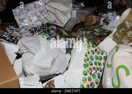 Crumpled up Christmas Wrapping Paper after opening Christmas Presents Stock Photo