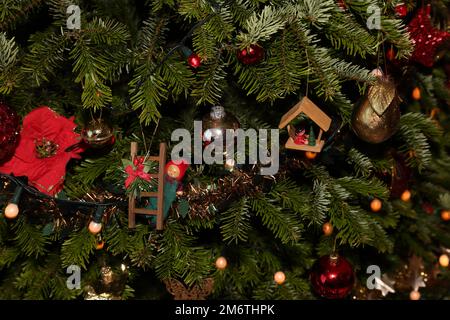Close Up Decorations on Real Evergreen Christmas Tree Stock Photo