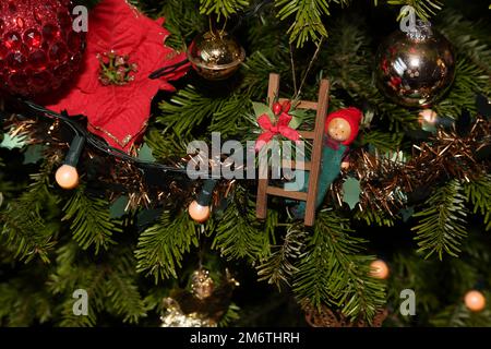 Close Up Decorations on Real Evergreen Christmas Tree Stock Photo
