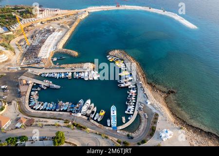 Drone aerial fishing boats moored in the harbour. pernera Protaras Cyprus. Stock Photo