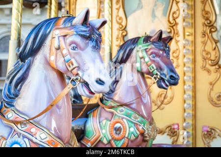 Florence, Italy - Circa March 2022: vintage carousel horse - antique attraction. Stock Photo
