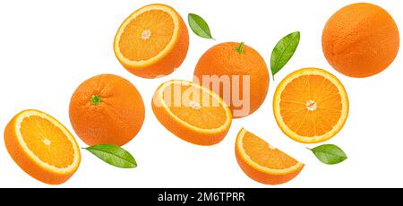Falling orange fruits isolated on white background Stock Photo