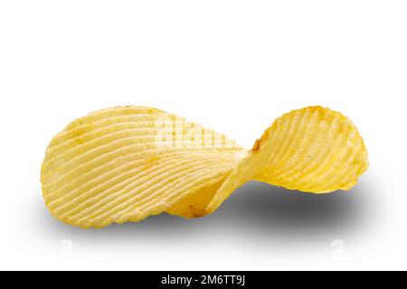 Closeup view of dry corrugated crispy salted potato chips isolated on white background. Stock Photo