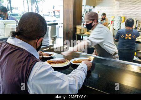 Mexico City,Juarez Cuauhtemoc Avenida Paseo de la Reforma,Taqueria El Califa,kitchen counter chef cook,man men male adult adults resident residents,in Stock Photo