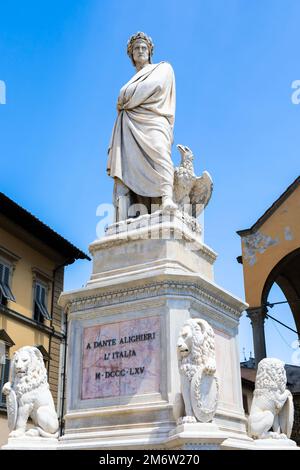 Dante Alighieri statue in Florence, Tuscany region, Italy, with amazing blue sky background. Stock Photo