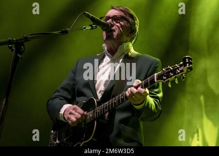 GUILDFORD, ENGLAND: Dr John Cooper Clarke and Squeeze perform on stage at G Live. Featuring: Chris Difford Where: Guildford, United Kingdom When: 29 Nov 2022 Credit: Neil Lupin/WENN Stock Photo