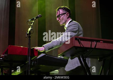 GUILDFORD, ENGLAND: Dr John Cooper Clarke and Squeeze perform on stage at G Live. Featuring: Stephen Large Where: Guildford, United Kingdom When: 29 Nov 2022 Credit: Neil Lupin/WENN Stock Photo