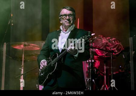 GUILDFORD, ENGLAND: Dr John Cooper Clarke and Squeeze perform on stage at G Live. Featuring: Chris Difford Where: Guildford, United Kingdom When: 29 Nov 2022 Credit: Neil Lupin/WENN Stock Photo