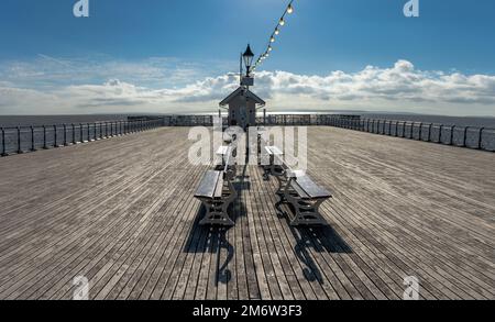 A view of the the wooden deck of the Victorian Pier in Penarth Stock Photo