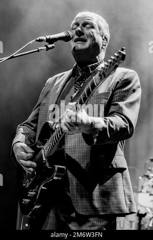 GUILDFORD, ENGLAND: Dr John Cooper Clarke and Squeeze perform on stage at G Live. Featuring: Glenn Tilbrook Where: Guildford, United Kingdom When: 29 Nov 2022 Credit: Neil Lupin/WENN Stock Photo