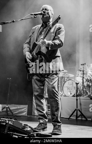 GUILDFORD, ENGLAND: Dr John Cooper Clarke and Squeeze perform on stage at G Live. Featuring: Glenn Tilbrook Where: Guildford, United Kingdom When: 29 Nov 2022 Credit: Neil Lupin/WENN Stock Photo