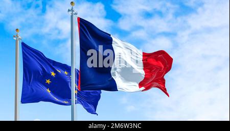 The flags of France and the European Union waving in the wind Stock Photo