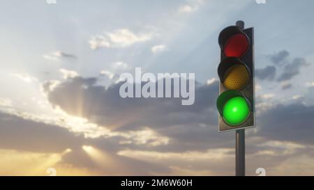 Traffic light shows green with sunset Stock Photo