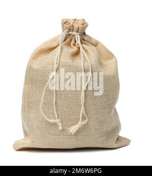 Full canvas bag tied with rope and isolated on a white background Stock Photo