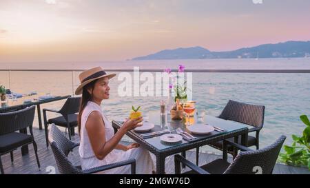Romantic dinner on the beach with Thai food during sunset on the Island Phuket Thailand Stock Photo